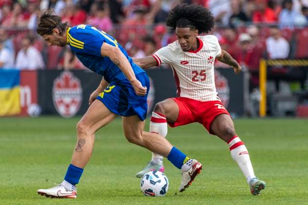 June 7, 2025, Toronto, Ontario, Canada: Illya Zabarnyi 13 (L) battles for the ball against Jayden Nelson 25 (R) during the Canadian Shield Tournament match at BMO Field on June 7, 2025 in Toronto, Ontario, Canada. The game ended 4-2 for Canada Toronto Canada - ZUMAm154 20250607_zap_m154_046 Copyright: xAngelxMarchinix