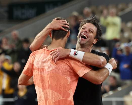 (250608) -- PARIS, June 8, 2025 -- Marcel Granollers Horacio Zeballos (R) celebrate after winning the men s doubles final match between Marcel Granollers of Spain Horacio Zeballos of Argentina and Joe Salisbury Neal Skupski of Britain at the French Open tennis tournament at Roland Garros, Paris, France, June 7, 2025. ) (SP)FRANCE-PARIS-TENNIS-FRENCH OPEN-MEN S DOUBLES-FINAL LixJing 