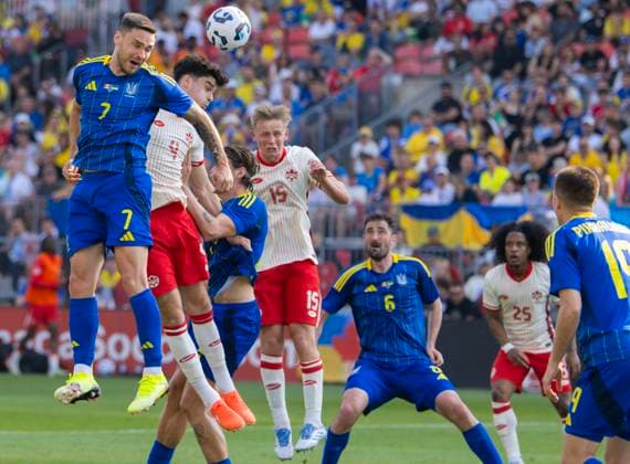 (250608) -- TORONTO, June 8, 2025 -- Oleksiy Hutsuliak (1st L) of Ukraine vies for a header with Jamie Knight-Lebel (2nd L) of Canada during the Canadian Shield Tournament football match between Canada and Ukraine at BMO Field in Toronto, Canada, June 7, 2025. (Photo by Xinhua) (SP)CANADA-TORONTO-FOOTBALL-CANADIAN SHIELD TOURNAMENT-CANADA VS UKRAINE ZouxZheng 