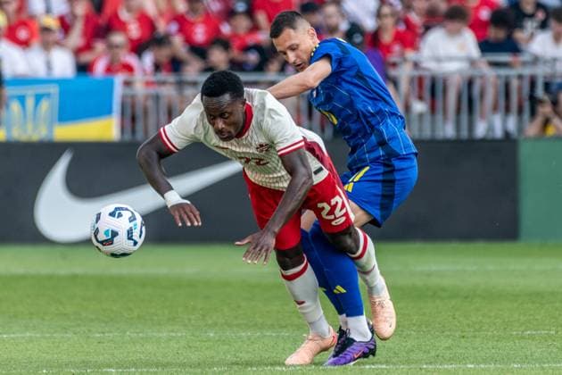 June 7, 2025, Toronto, Ontario, Canada: Richie Laryea 22 (L) and Vladyslav Kabayev 11 (R) seen in action during the Canadian Shield Tournament match between Ukraine and Canada at BMO Field. Final scores; Canada 4-2 Ukraine. Toronto Canada - ZUMAs197 20250607_aaa_s197_647 Copyright: xAngelxMarchinix