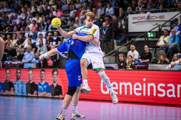 Andri Mar Runarsson SC DHfK Leipzig, 04 vs Lukas Laube TVB Stuttgart, 24 GER, TVB Stuttgart SC DHfK Leipzig, DAIKIN HBL, Handball, Bundesliga, 34 Matchday, Season 2024 2025, 08 06 2025 GER, TVB Stuttgart SC DHfK Leipzig, DAIKIN HBL, Handball, Bundesliga, 34 Matchday, Season 2024 2025, 08 06 2025 Stuttgart Copyright: xSandyxDinkelackerx EP_SDR