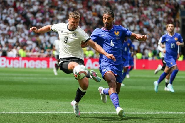 UEFA Nations League Match for 3rd place 24 25 Germany France on 08 06 2025 at the MHP Arena in Stuttgart Loic Bade France 4 in a duel against Niclas Füllkrug Fuellkrug Fullkrug Germany 9 MH