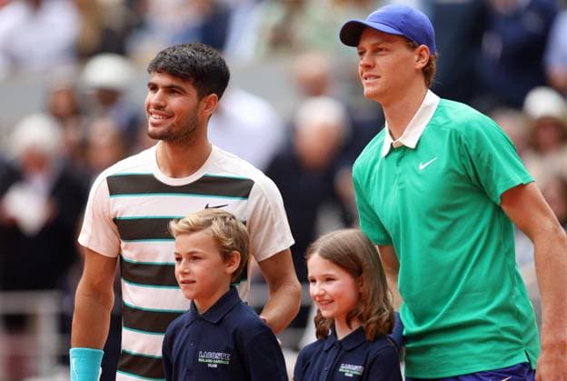 Carlos Alcaraz of Spain and Jannik Sinner of Italy pose at the net with mascots French Open Tennis, Day Fifteen, Tennis, Roland Garros, Paris, France - 08 Jun 2025 EDITORIAL USE ONLY No use with unauthorised audio, video, data, fixture lists, club league logos or live services. Online in-match use limited to 120 images, no video emulation. No use in betting, games or single club league player publications. Copyright: xEllaxLing Shutterstockx 15346226bk