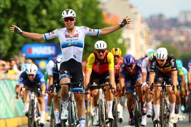 Belgian Tim Merlier of Soudal Quick-Step celebrates as he crosses the finish line to win the Brussels Cycling Classic one day cycling race, 205,1 km from and to Brussels, Sunday 08 June 2025. DAVIDxPINTENS  x126450738x