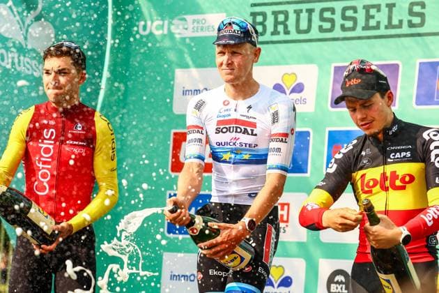 French Alexis Renard of Cofidis, Belgian Tim Merlier of Soudal Quick-Step and Belgian Arnaud De Lie of Lotto Cycling Team pictured on the podium after the Brussels Cycling Classic one day cycling race, 205,1 km from and to Brussels, Sunday 08 June 2025. DAVIDxPINTENS  x126452225x