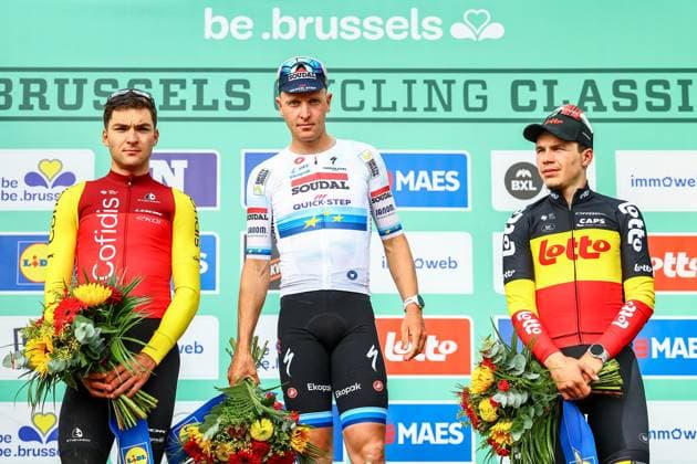 French Alexis Renard of Cofidis, Belgian Tim Merlier of Soudal Quick-Step and Belgian Arnaud De Lie of Lotto Cycling Team pictured on the podium after the Brussels Cycling Classic one day cycling race, 205,1 km from and to Brussels, Sunday 08 June 2025. DAVIDxPINTENS  x126452270x