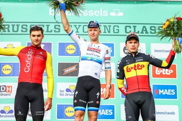 French Alexis Renard of Cofidis, Belgian Tim Merlier of Soudal Quick-Step and Belgian Arnaud De Lie of Lotto Cycling Team pictured on the podium after the Brussels Cycling Classic one day cycling race, 205,1 km from and to Brussels, Sunday 08 June 2025. DAVIDxPINTENS  x126452276x