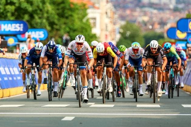 Belgian Tim Merlier of Soudal Quick-Step, French Alexis Renard of Cofidis and Belgian Arnaud De Lie of Lotto Cycling Team pictured in action during the Brussels Cycling Classic one day cycling race, 205,1 km from and to Brussels, Sunday 08 June 2025. DAVIDxPINTENS  x126452520x