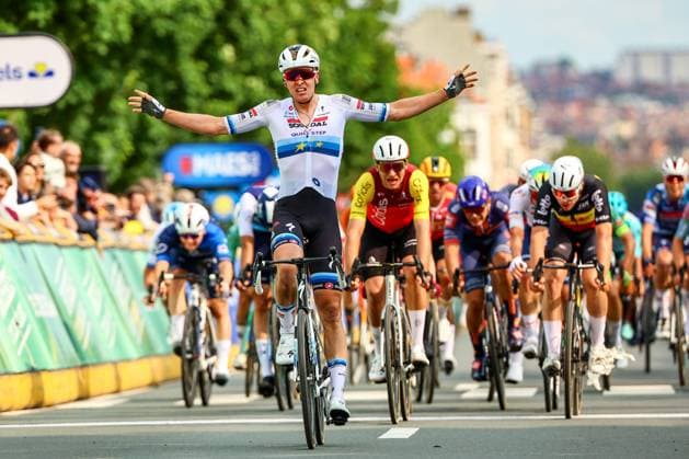 Belgian Tim Merlier of Soudal Quick-Step celebrates as he crosses the finish line to win the Brussels Cycling Classic one day cycling race, 205,1 km from and to Brussels, Sunday 08 June 2025. DAVIDxPINTENS  x126452521x