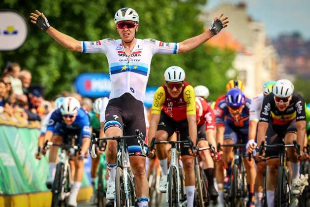 Belgian Tim Merlier of Soudal Quick-Step celebrates as he crosses the finish line to win the Brussels Cycling Classic one day cycling race, 205,1 km from and to Brussels, Sunday 08 June 2025. DAVIDxPINTENS  x126452530x