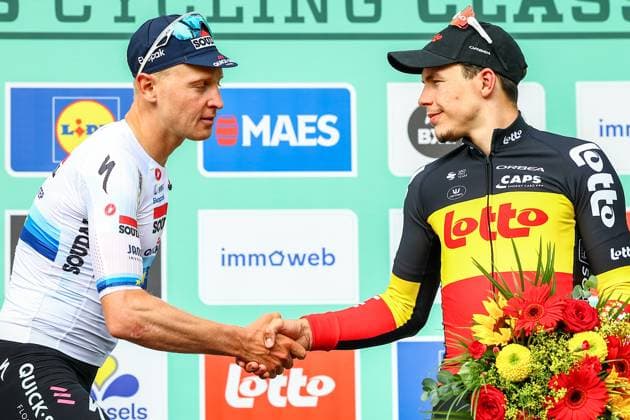 Belgian Tim Merlier of Soudal Quick-Step and Belgian Arnaud De Lie of Lotto Cycling Team pictured on the podium after the Brussels Cycling Classic one day cycling race, 205,1 km from and to Brussels, Sunday 08 June 2025. DAVIDxPINTENS  x126452581x
