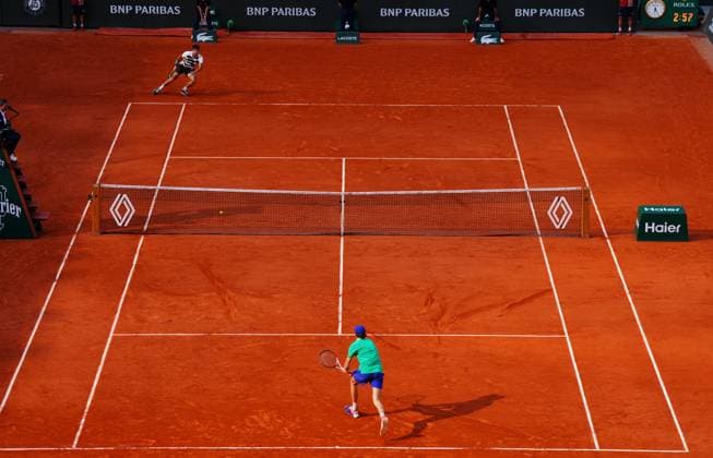 Carlos Alcaraz nets a return to hand a break back to Jannik Sinner 5-4 in the 3rd French Open Tennis, Day Fifteen, Tennis, Roland Garros, Paris, France - 08 Jun 2025 EDITORIAL USE ONLY No use with unauthorised audio, video, data, fixture lists, club league logos or live services. Online in-match use limited to 120 images, no video emulation. No use in betting, games or single club league player publications. Copyright: xJavierxGarcia Shutterstockx 15346224ad