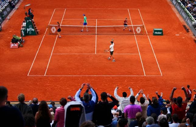 Carlos Alcaraz takes the first game of the fifth and deciding set French Open Tennis, Day Fifteen, Tennis, Roland Garros, Paris, France - 08 Jun 2025 EDITORIAL USE ONLY No use with unauthorised audio, video, data, fixture lists, club league logos or live services. Online in-match use limited to 120 images, no video emulation. No use in betting, games or single club league player publications. Copyright: xJavierxGarcia Shutterstockx 15346224ak