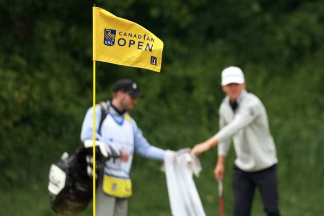 RBC Canadian Open 2025 at TPC Toronto at Osprey Valley CALEDON, ONTARIO - JUNE 08: The Canadian Open flag waves on the pin with Jeremy Paul of Heidelberg, Germany and his caddie on the 10th green in the backgroun during the final round of the RBC Canadian Open 2025 at TPC Toronto at Osprey Valley on Sunday, June 08, 2025 in Caledon, Ontario, Canada. Caledon Ontario United States  Copyright: xAmyxLemusx originalFilename:lemus-rbccanad250608_npfRT.jpg