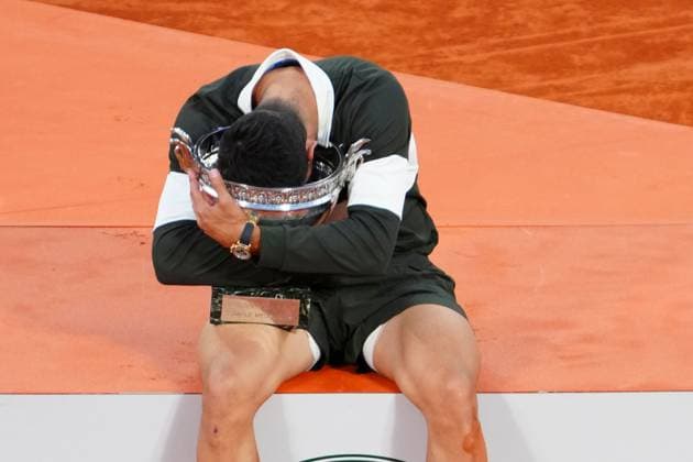 Carlos Alcaraz with the trophy French Open Tennis, Day Fifteen, Tennis, Roland Garros, Paris, France - 08 Jun 2025 EDITORIAL USE ONLY No use with unauthorised audio, video, data, fixture lists, club league logos or live services. Online in-match use limited to 120 images, no video emulation. No use in betting, games or single club league player publications. Copyright: xJavierxGarcia Shutterstockx 15346224be