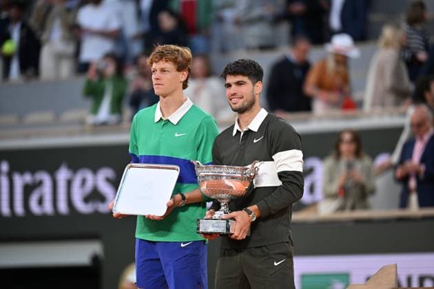 2025 Roland-Garros - Men s Single Final PARIS, FRANCE - JUNE 08: Winner Spain s Carlos Alcaraz (R) poses with the trophy next to Italy s Jannik Sinner at the end of their men s singles final match on day 15 of the French Open tennis tournament on Court Philippe-Chatrier at the Roland-Garros Complex in Paris on June 8, 2025. Burak Akbulut Anadolu Paris France. Editorial use only. Please get in touch for any other usage.  Copyright: x2025xAnadoluxBurakxAkbulutx
