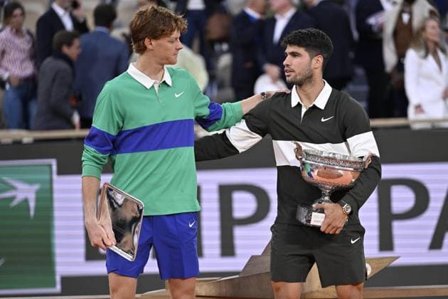 2025 Roland-Garros - Men s Single Final PARIS, FRANCE - JUNE 08: Winner Spain s Carlos Alcaraz (R) poses with the trophy next to Italy s Jannik Sinner at the end of their men s singles final match on day 15 of the French Open tennis tournament on Court Philippe-Chatrier at the Roland-Garros Complex in Paris on June 8, 2025. Burak Akbulut Anadolu Paris France. Editorial use only. Please get in touch for any other usage.  Copyright: x2025xAnadoluxBurakxAkbulutx