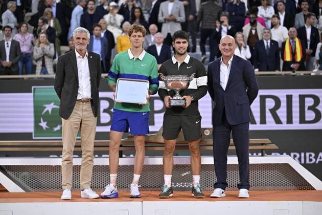 2025 Roland-Garros - Men s Single Final PARIS, FRANCE - JUNE 08: Winner Spain s Carlos Alcaraz (R) poses with the trophy next to Italy s Jannik Sinner at the end of their men s singles final match on day 15 of the French Open tennis tournament on Court Philippe-Chatrier at the Roland-Garros Complex in Paris on June 8, 2025. Burak Akbulut Anadolu Paris France. Editorial use only. Please get in touch for any other usage.  Copyright: x2025xAnadoluxBurakxAkbulutx