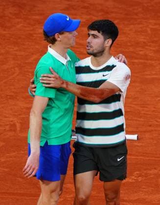 Jannik Sinner and Carlos Alcaraz hug after the match, their first Grand Slam Final won by Alcaraz in five sets French Open Tennis, Day Fifteen, Tennis, Roland Garros, Paris, France - 08 Jun 2025 EDITORIAL USE ONLY No use with unauthorised audio, video, data, fixture lists, club league logos or live services. Online in-match use limited to 120 images, no video emulation. No use in betting, games or single club league player publications. Copyright: xJavierxGarcia Shutterstockx 15346224bx