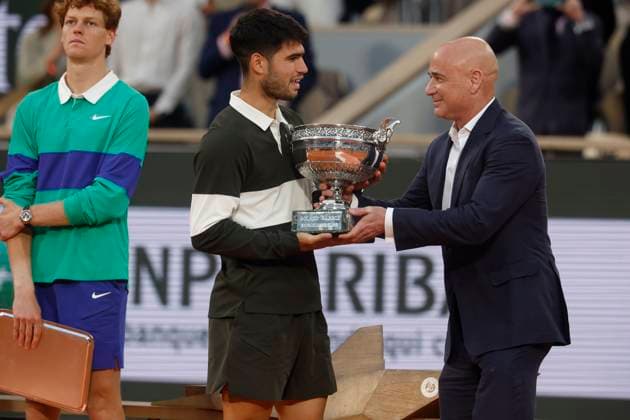 June 8, 2025, Paris, Paris, France: Carlos Alcaraz and Andro Agassi during the trophy cermony ofthe tennis Grand Slam of Roland Garros 2025 menÃ¢â‚¬â ¢s final match between Jannik Sinner (ITA) and Carlos Alcaraz (ESP) at Philippe Chatrier central court in Roland Garros Stadium - on June 08 2025.Paris - France Paris France - ZUMAb253 20250608_zsp_b253_161 Copyright: xLoicxBaratouxx
