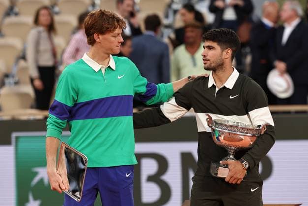 (250609) -- PARIS, June 9, 2025 -- Jannik Sinner (L) reacts to Carlos Alcaraz during the awarding ceremony after the men s singles final match between Jannik Sinner of Italy and Carlos Alcaraz of Spain at the French Open tennis tournament at Roland Garros, Paris, France, June 8, 2025. ) (SP)FRANCE-PARIS-TENNIS-FRENCH OPEN-MEN S SINGLES-FINAL LixJing 