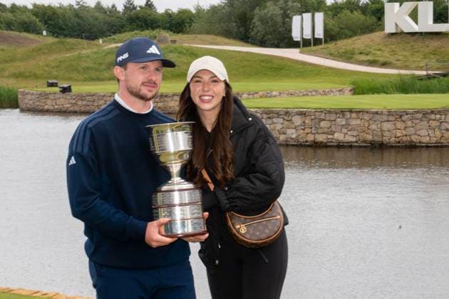 2025-06-08 KLM OPEN 2025 AMSTERDAM, THE NETHERLANDS - JUNE 8: Connor Syme of Scotland winner of the KLM Open 2025 met zijn vrouw Lanny Hill during Round 4 of the KLM Open 2025, DP World Tour at The International on June 8, 2025 in Amsterdam, The Netherlands. Amsterdam The International The Netherlands Content not available for redistribution in The Netherlands directly or indirectly through any third parties. Copyright: xHenkxSeppenx