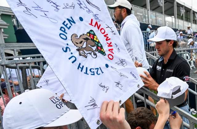 Fans collect autographs as players exits the 18th green on the first practice round of the USGA 125 U.S. Open Championship in Oakmont Pennsylvania near Pittsburgh on Monday, June 9, 2025.  PIT2025060923 ArchiexCarpenter