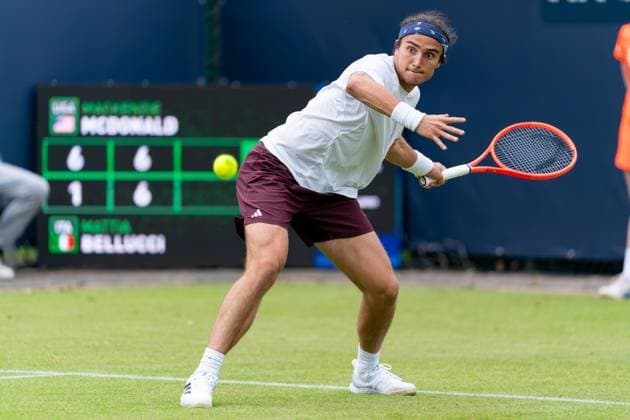 2025-06-10 2025 Libema Open Grass Court Championships ROSMALEN, NETHERLANDS - JUNE 10: Mattia Bellucci of Italy in action during Day Two of 2025 Libema Open Grass Court Championships at Autotron on June 10, 2025 in Rosmalen, Netherlands. Rosmalen Autotron Netherlands Content not available for redistribution in The Netherlands directly or indirectly through any third parties. Copyright: xJorisxVerwijstx