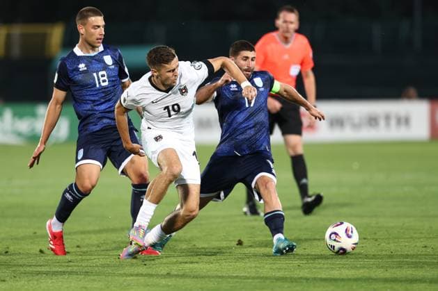 SOCCER - FIFA WC quali, SMR vs AUT SERRAVALLE,SAN MARINO,10.JUN.25 - SOCCER - FIFA World Cup, WM, Weltmeisterschaft, Fussball 2026, European Qualifiers, group stage, OEFB international match, Länderspiel, Nationalmannschaft San Marino vs Austria. Image shows Samuele Zannoni, Christoph Baumgartner (AUT) and Alessandro Golinucci (SMR).  GEPAxpictures xArminxRauthner