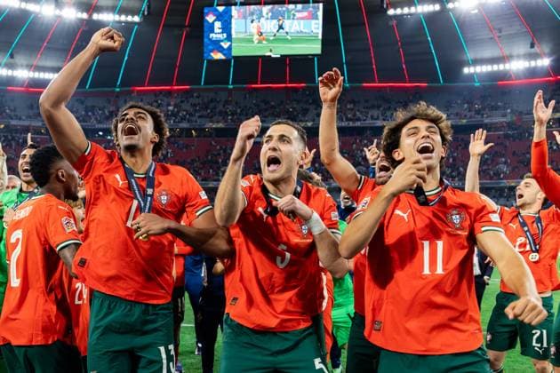 June 9, 2025, Munich, Germany: (L-R) Renato Veiga, Diogo Dalot, Joao Felix of Portugal celebrate a win during the ceremony after the UEFA Nations League 2025 final match between Portugal and Spain at Munich Football Arena.. Final score: Portugal 2:2 (penalties 5:3) Spain. Munich Germany - ZUMAs197 20250609_aab_s197_092 Copyright: xMikolajxBarbanellx