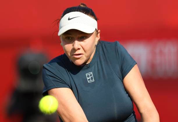 11th June 2025; HSBC Championships, Queen s Club, West Kensington, London, England: HSBC Womens Championships Queens Club, Day 3; Amanda Anisimova (USA) plays a backhand against Sonay Kartal (GBR)  ActionPlus12800298 HongboxChen