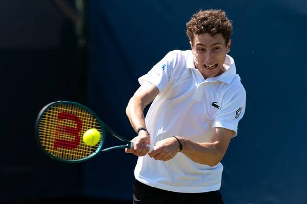 2025-06-12 2025 Libema Open Grass Court Championships ROSMALEN, NETHERLANDS - JUNE 12: Ugo Humbert of France in action during Day Four of 2025 Libema Open Grass Court Championships at Autotron on June 12, 2025 in Rosmalen, Netherlands. Rosmalen Autotron Netherlands Content not available for redistribution in The Netherlands directly or indirectly through any third parties. Copyright: xJorisxVerwijstx