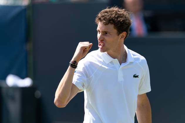 2025-06-12 2025 Libema Open Grass Court Championships ROSMALEN, NETHERLANDS - JUNE 12: Ugo Humbert of France reacts during Day Four of 2025 Libema Open Grass Court Championships at Autotron on June 12, 2025 in Rosmalen, Netherlands. Rosmalen Autotron Netherlands Content not available for redistribution in The Netherlands directly or indirectly through any third parties. Copyright: xJorisxVerwijstx
