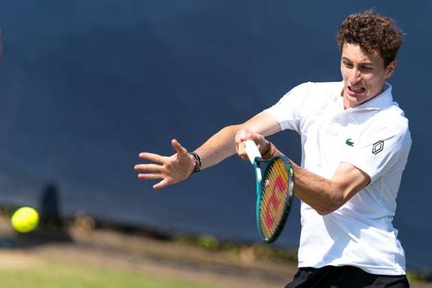 2025-06-12 2025 Libema Open Grass Court Championships ROSMALEN, NETHERLANDS - JUNE 12: Ugo Humbert of France in action during Day Four of 2025 Libema Open Grass Court Championships at Autotron on June 12, 2025 in Rosmalen, Netherlands. Rosmalen Autotron Netherlands Content not available for redistribution in The Netherlands directly or indirectly through any third parties. Copyright: xJorisxVerwijstx
