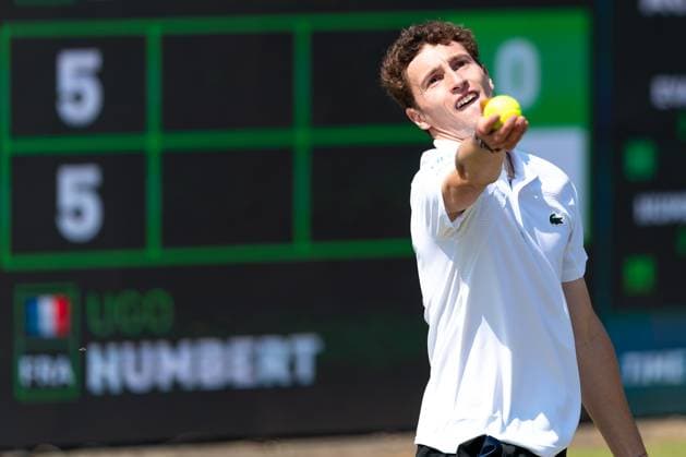2025-06-12 2025 Libema Open Grass Court Championships ROSMALEN, NETHERLANDS - JUNE 12: Ugo Humbert of France in action during Day Four of 2025 Libema Open Grass Court Championships at Autotron on June 12, 2025 in Rosmalen, Netherlands. Rosmalen Autotron Netherlands Content not available for redistribution in The Netherlands directly or indirectly through any third parties. Copyright: xJorisxVerwijstx