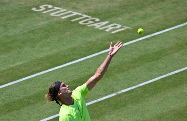 Alexander Zverev GER Action Serve Logo Stuttgart on grass Tennis Men BOSS Open ATP 250 Stuttgart 2025 Weissenhof BOSS Open ATP 250 Stuttgart 2025