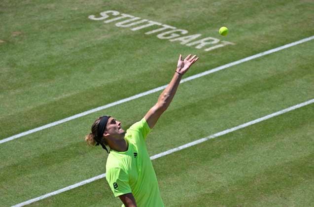 Alexander Zverev GER Action Serve Logo Stuttgart on grass Tennis Men BOSS Open ATP 250 Stuttgart 2025 Weissenhof BOSS Open ATP 250 Stuttgart 2025