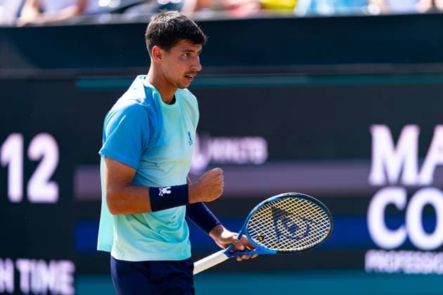 2025-06-12 2025 Libema Open Grass Court Championships ROSMALEN, NETHERLANDS - JUNE 12: Alexei Popyrin of Australia celebrates during Day Four of 2025 Libema Open Grass Court Championships at Autotron on June 12, 2025 in Rosmalen, Netherlands. Rosmalen Autotron Netherlands Content not available for redistribution in The Netherlands directly or indirectly through any third parties. Copyright: xJorisxVerwijstx