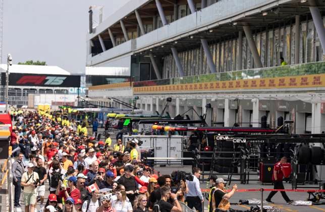 June 12, 2025, Montreal, Qc, CANADA: Race fans walk through pit lane during the open house at the Canadian Grand Prix Thursday, June 12, 2025 in Montreal. Canada News - June 12, 2025  - ZUMAc35_ 20250612_zaf_c35_008 Copyright: xChristinnexMuschix