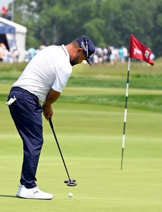 J.J. Spaun putts on the eighth green during the first round of the 125th U.S. Open Golf Championship at Oakmont Country Club in Oakmont, Pennsylvania on Thursday, June 12, 2025. Spaun finished the day at four-under-par.  PIT20250612705 ARCHIExCARPENTER