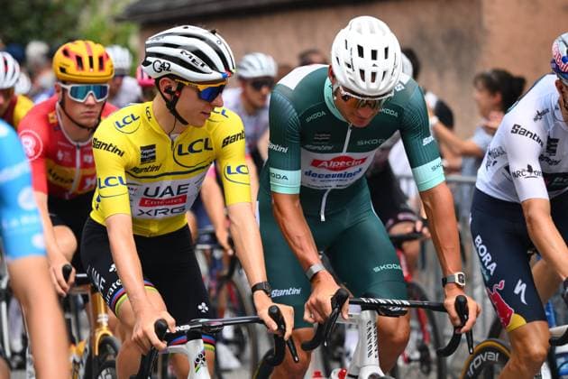 Criterium du Dauphine 2025 Stage 7 VALMEINIER 1800, FRANCE - JUNE 14 : Pogacar Tadej (SLO) of UAE Team Emirates - XRG and Van Der Poel Mathieu (NED) of Alpecin-Deceuninck during stage 7 of the 77th edition of Criterium du Dauphine Libere an UCI World Tour 2.UWT cycling road race stage for Men Elite of 131.6 km with start in Grand-Aigueblanche and finish in Valmeinier 1800 on June 14, 2025 in Valmeinier 1800, France, 14 06 2025 ( Motordriver Kenny Verfaillie - Valmeinier 1800 France  Copyright: xVincentxKalutx