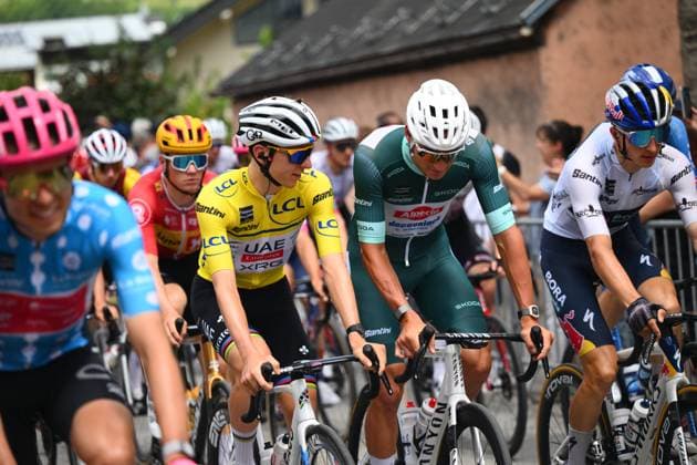 Criterium du Dauphine 2025 Stage 7 VALMEINIER 1800, FRANCE - JUNE 14 : Pogacar Tadej (SLO) of UAE Team Emirates - XRG and Van Der Poel Mathieu (NED) of Alpecin-Deceuninck during stage 7 of the 77th edition of Criterium du Dauphine Libere an UCI World Tour 2.UWT cycling road race stage for Men Elite of 131.6 km with start in Grand-Aigueblanche and finish in Valmeinier 1800 on June 14, 2025 in Valmeinier 1800, France, 14 06 2025 ( Motordriver Kenny Verfaillie - Valmeinier 1800 France  Copyright: xVincentxKalutx