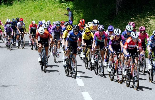 14 06 2025 Switzerland, Tour de Suisse Women 3 Stage Campus Sursee Kuessnacht SZ Picture The field of riders on the ascent to the Bregpreis Boehler In front the mountain prize leader Marta Lach Team SD Worx Protime Action