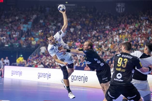 14 06 2025, Handball, Semi-final TruckScout24 EHF FINAL4, LANXESS arena Cologne, Füchse Berlin HBC Nantes Julien Bos HBC Nantes FRA 13 vs Max Darj Fuechse Berlin 05 Nordrhein Westfalen Germany