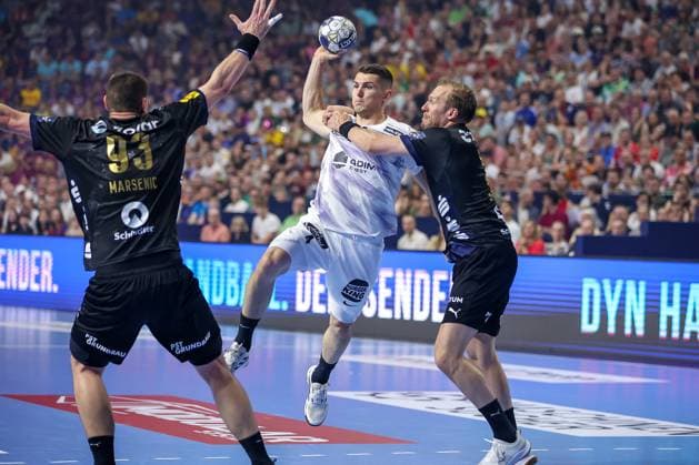 14 06 2025, Handball, Semi-final TruckScout24 EHF FINAL4, LANXESS arena Cologne, Füchse Berlin HBC Nantes Aymeric Minne HBC Nantes FRA 04 vs Max Darj Fuechse Berlin 05 North Rhine-Westphalia Germany