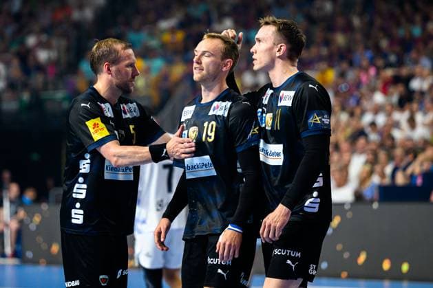 Cologne, Germany Handball EHF CL Final 4 Semi-Final Fuechse Berlin HBC Nantes from left Max Darj Berlin , Mathias Gidsel Berlin , Lasse Bredekjaer Andersson Berlin Cologne Lanxess Arena Nordrhein Westfalen Germany