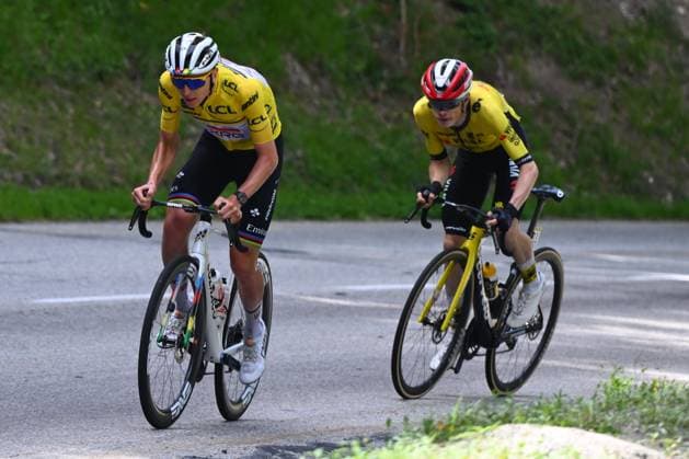 Criterium du Dauphine 2025 Stage 7 VALMEINIER 1800, FRANCE - JUNE 14 : Pogacar Tadej (SLO) of UAE Team Emirates - XRG and Vingegaard Jonas (DEN) of Team Visma - Lease a Bike during stage 7 of the 77th edition of Criterium du Dauphine Libere an UCI World Tour 2.UWT cycling road race stage for Men Elite of 131.6 km with start in Grand-Aigueblanche and finish in Valmeinier 1800 on June 14, 2025 in Valmeinier 1800, France, 14 06 2025 ( Motordriver Kenny Verfaillie - Valmeinier 1800 France  Copyright: xVincentxKalutx