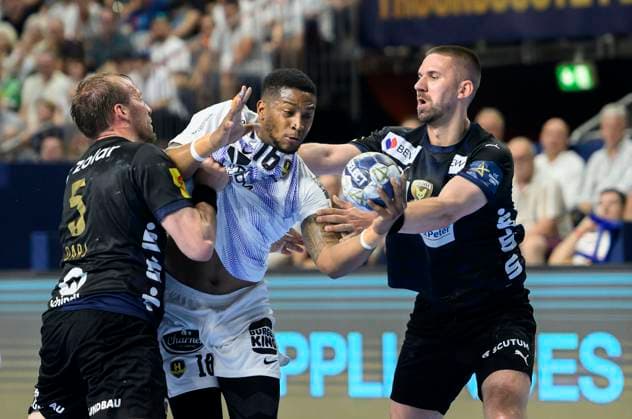 from l Max DARJ B , O Brian NYATEU NAN , Fabian WIEDE B , action, duel, Handball Champions League Final Four 2025, semi-final, Fuechse Berlin B HBC Nantes NAN , on 14 06 2025 in Cologne Germany Â