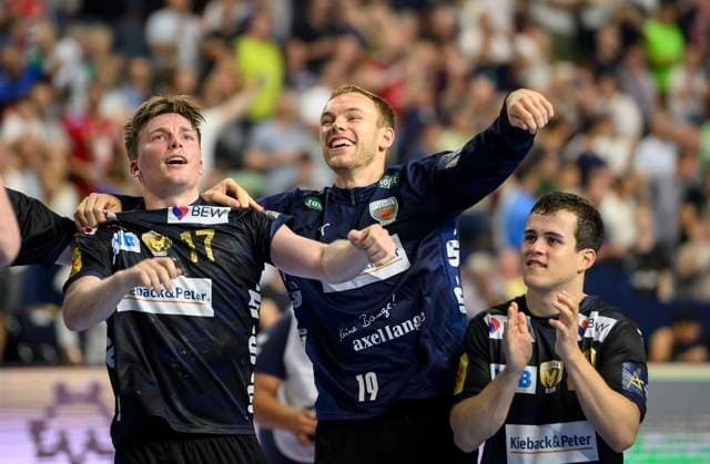 Final cheer B, f l Nils LICHTLEIN B , Mathias GIDSEL B , Tim FREIHOEFER Freihöfer B Handball Champions League Final Four 2025, semi-final, Fuechse Berlin B HBC Nantes NAN , on 14 06 2025 in Cologne Germany Â