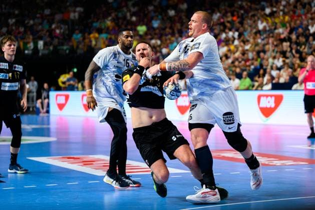 Cologne, Germany Handball EHF CL Final 4 Semi-Final Fuechse Berlin HBC Nantes v li in duel Fabian Wiede Berlin , Matej Gaber Nantes Cologne Lanxess Arena Nordrhein Westfalen Germany